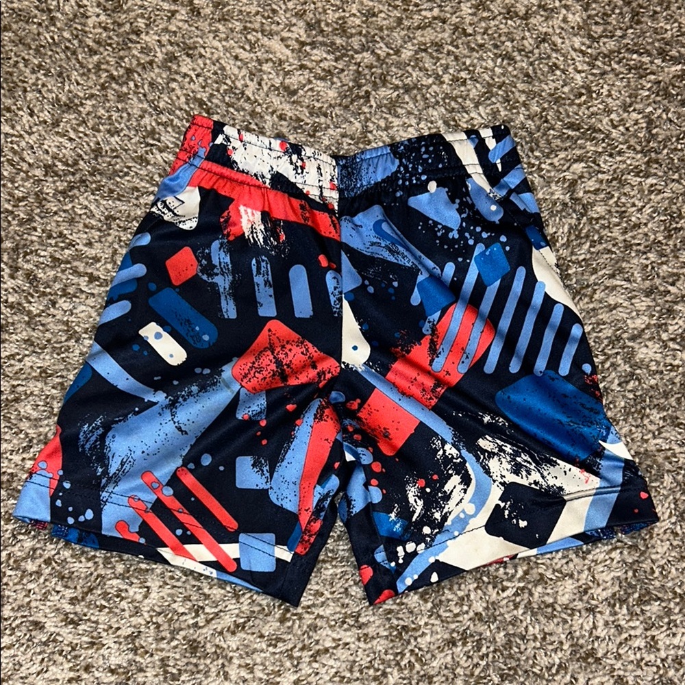 Boys Nike Athletic Blue and Red Geometric Shorts